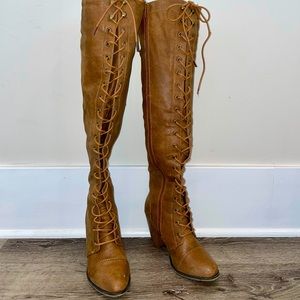 Thigh high chunky heel lace up boot